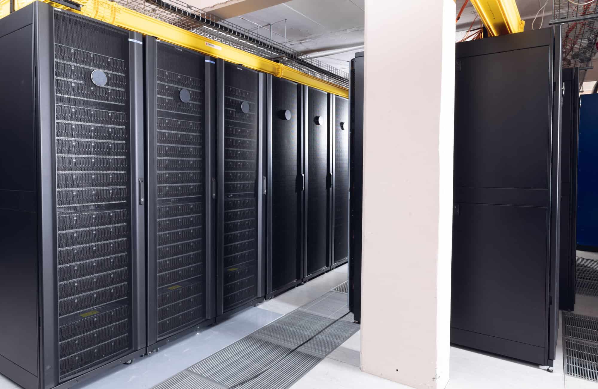 Data center with operational server stacks and live sensor data for digital twins.